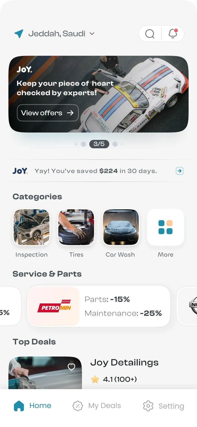 Joyapp home screen: location, an offers banner, savings, service categories, partner offers and top deals.